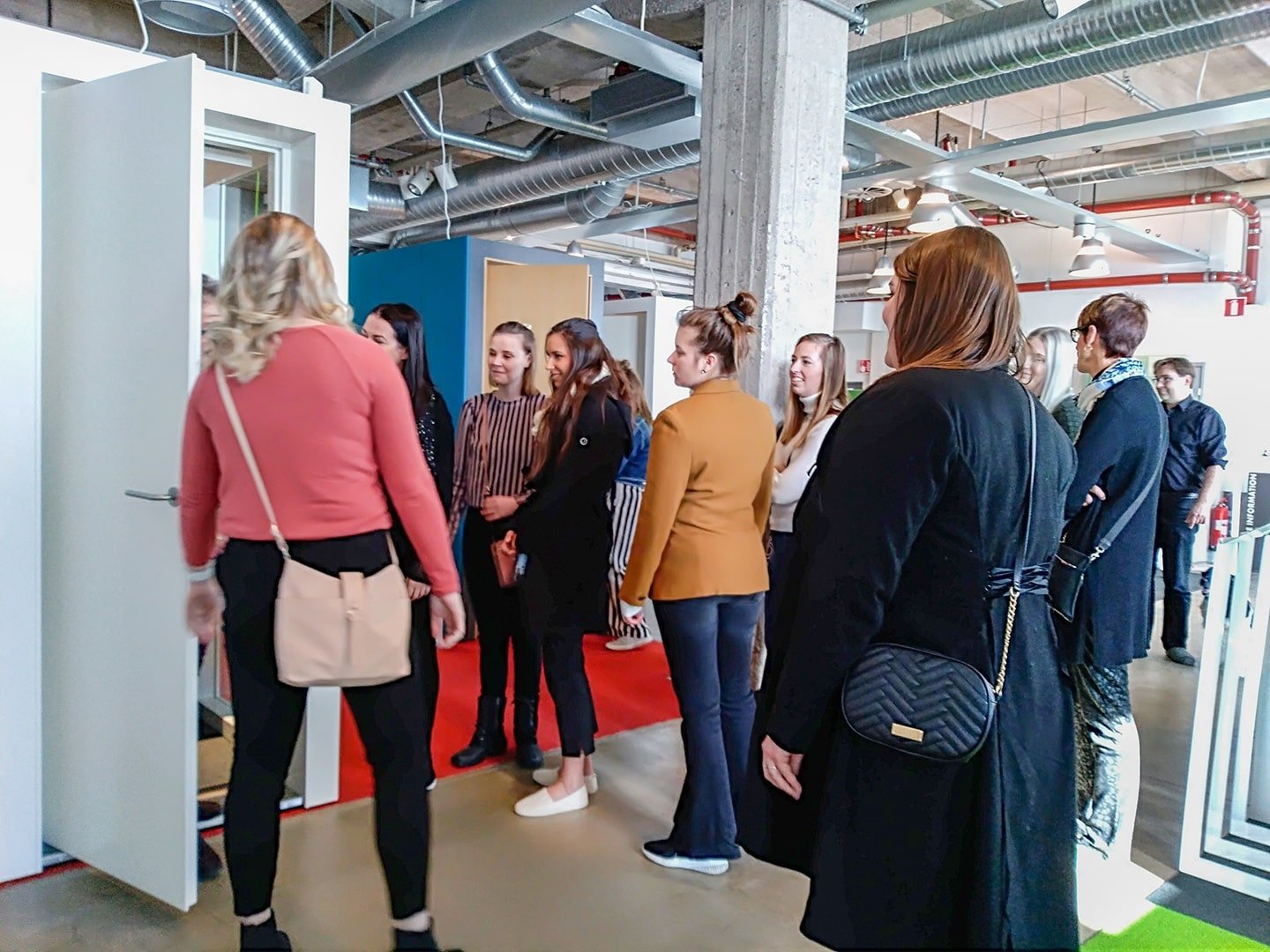 Students visiting INTO SHOWROOM - INTO the Nordic Silence